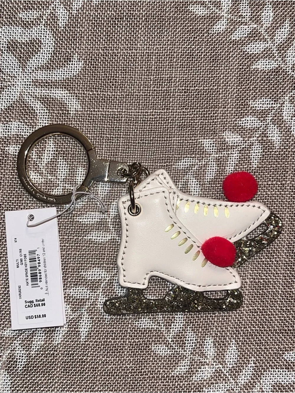 kate spade NWT! Ice skate key fob with red pom-poms